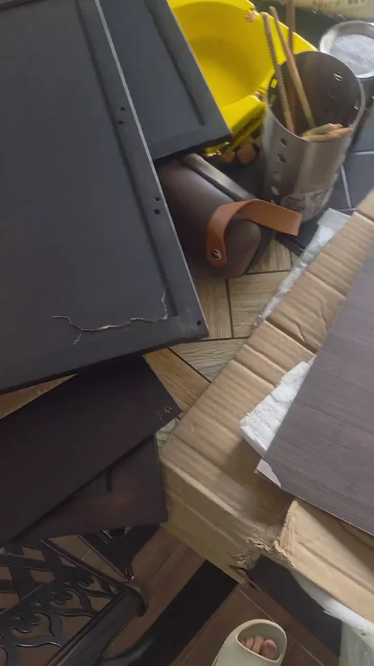 Broken furniture panels shown in the buyer’s original footage